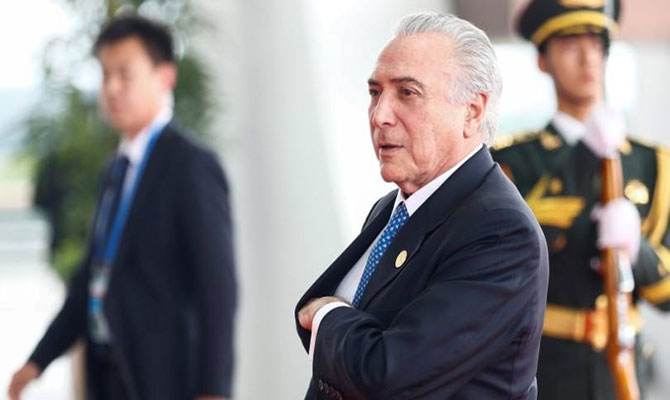巴西总统宝座暂保 危机难言结束？